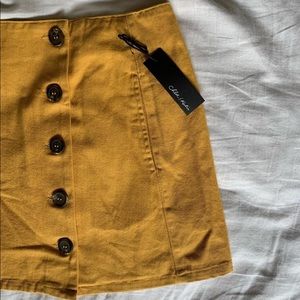 yellow/mustard button skirt